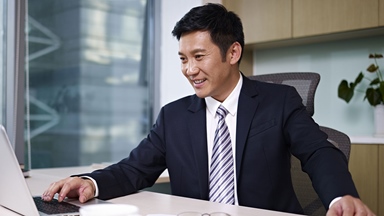 man-sitting-at-desk